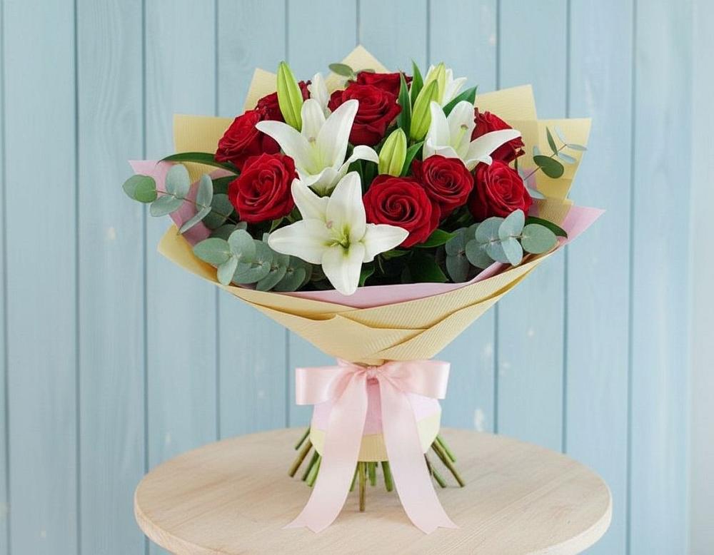 Букет цветов из: Лилии и Розы в Славный
